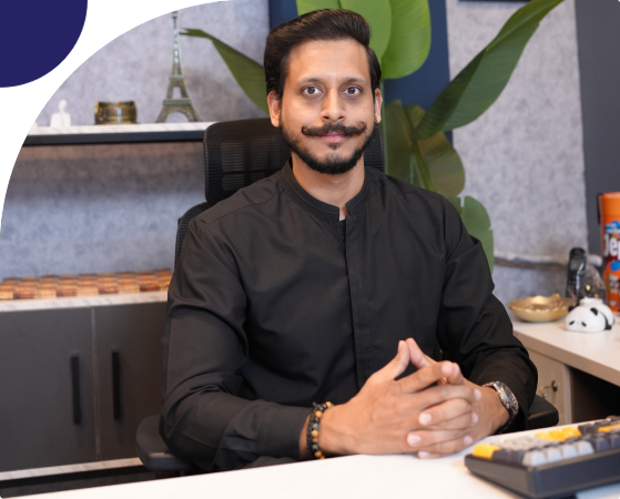 Two hands shaking over financial documents